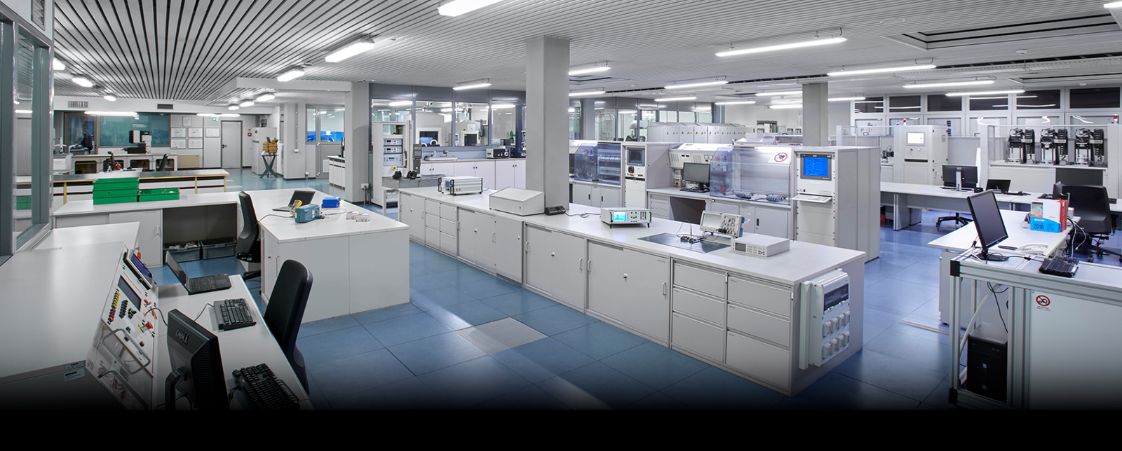 Inspector reviewing calibration documentation in a regulated environment